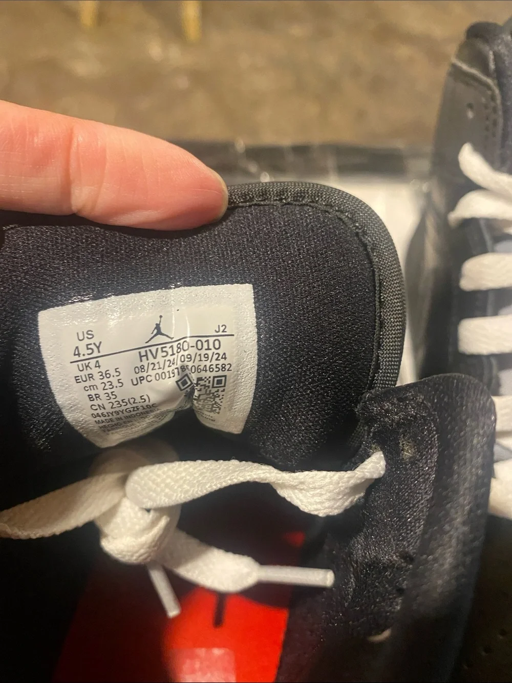 Nike Air Jordan 1 Mid - Black with White Laces and Red Tongue